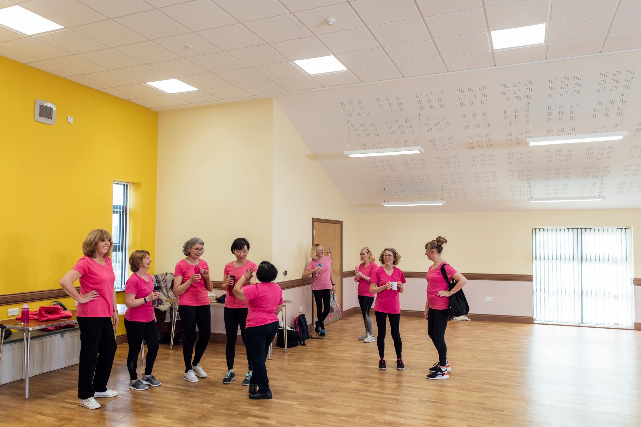 Friends taking a break together during dance class