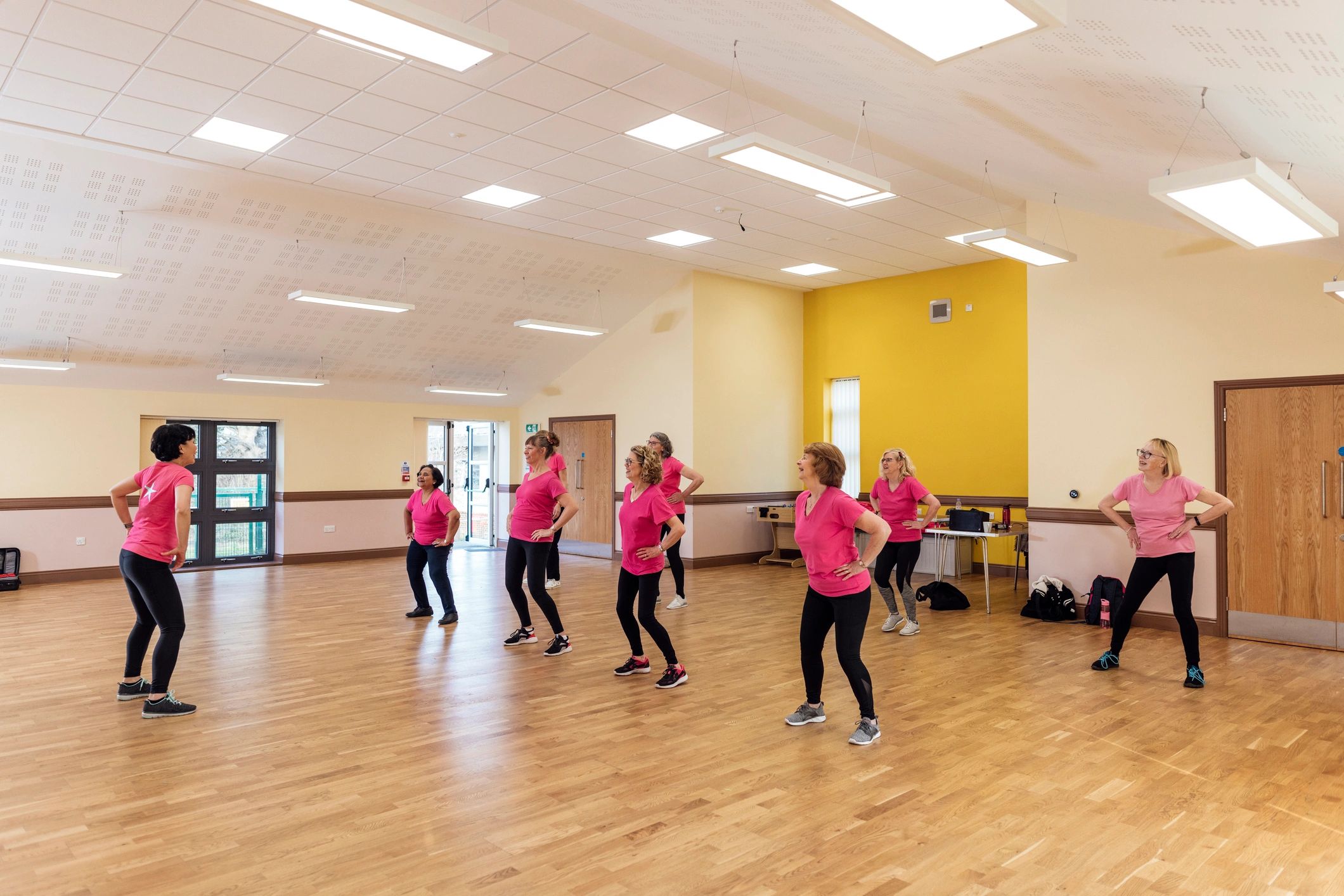 Dance instructor leading a group class