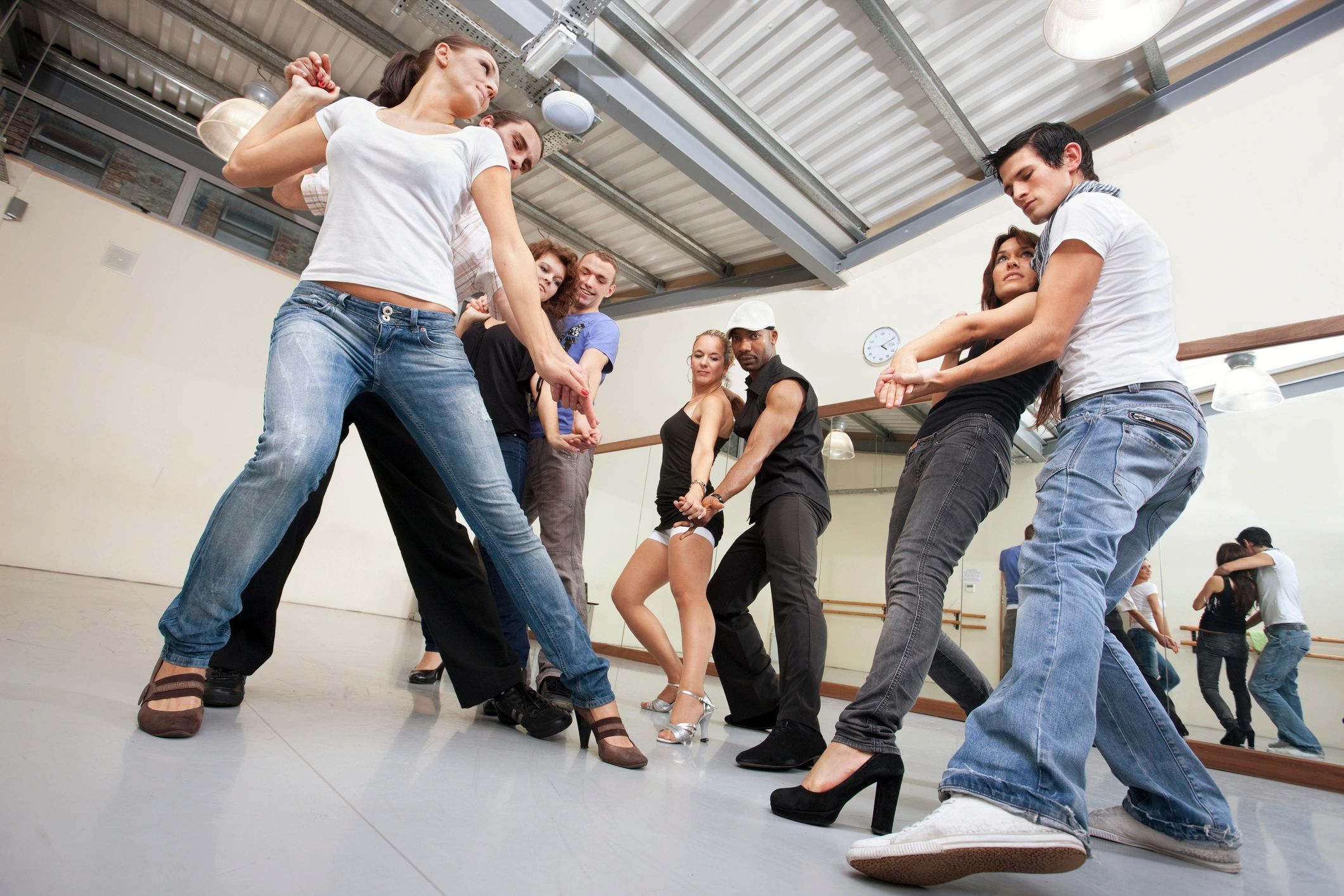 Dancers practicing together in a studio